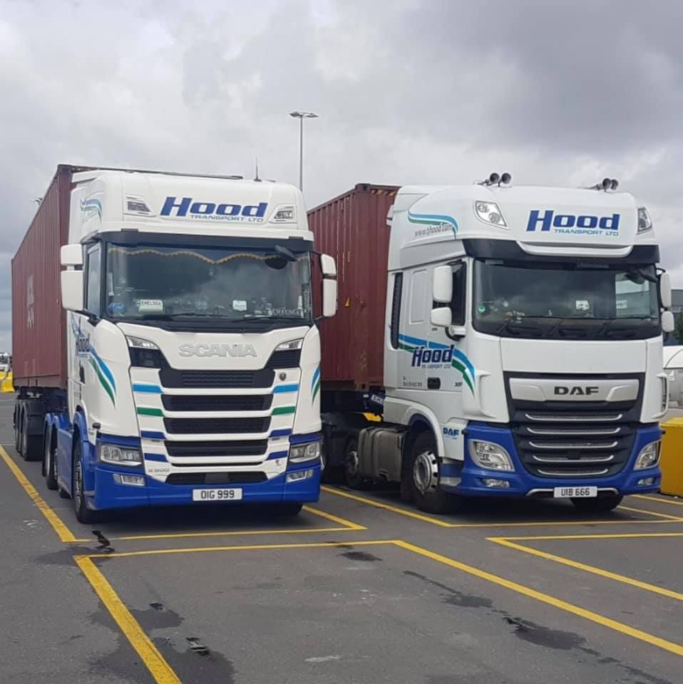tj-hood-fleet-container-haulage.jpg Two Northern Irish haulage lorries carrying shipping containers, part of the company’s European transport fleet